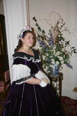 Mrs. Lincoln anticipates a great evening with her husband, the President.